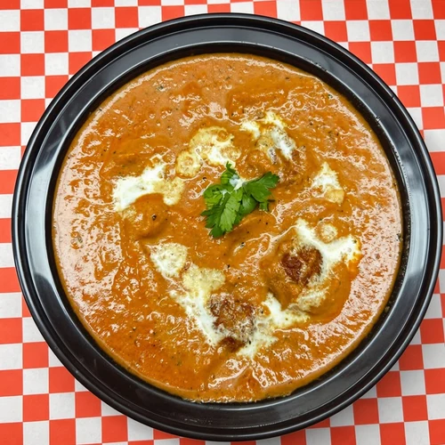 Malai kofta in a creamy curry sauce at Lutf Indo-Pak Cuisine