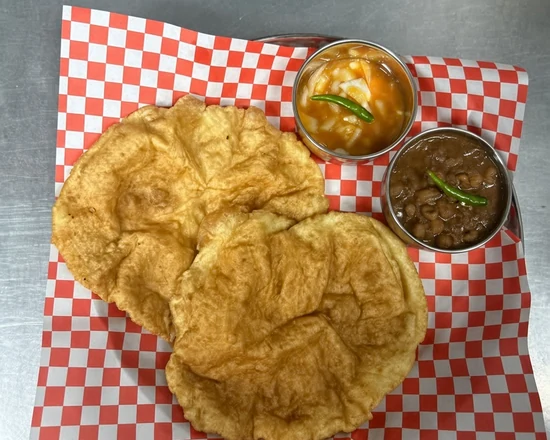 Puffed bhatura with chickpea curry at Lutf Indo-Pak Cuisine