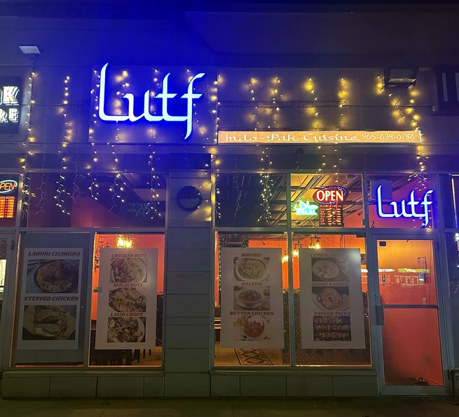 Lutf Indo-Pak Cuisine storefront illuminated at night