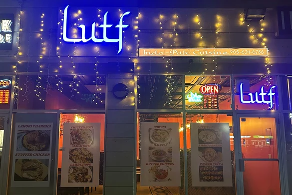 Lutf Indo-Pak Cuisine storefront illuminated at night